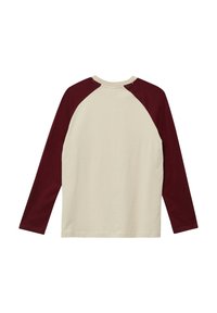 Langarmshirt met een crème lichaam en bordeauxrode raglanmouwen. Zachte katoen stof, ronde halslijn en eenvoudige stikdetails.
