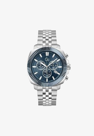 Silberner Edelstahl-Armbanduhr mit blauem strukturiertem Zifferblatt, drei Unterzifferblättern und einem Datumsfenster, versehen mit einer geriffelten Lünette und einem Gliederarmband.