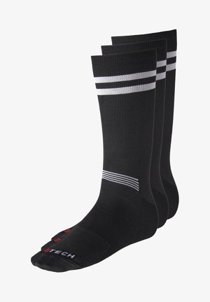 Calze sportive nere con strisce bianche, texture a costine e punta rinforzata. Include tre coppie con un logo rosso sulla punta.