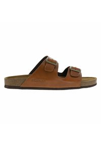 Sandali in pelle marrone con due fibbie regolabili, soletta in sughero e suola in gomma testurizzata. Logo "REDSKINS" impresso di lato.