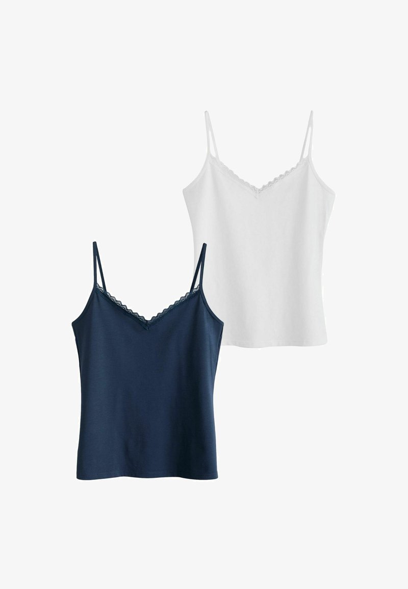 Deux camisoles sans manches bordées de dentelle, une bleu marine et une blanche, présentées sur fond blanc.