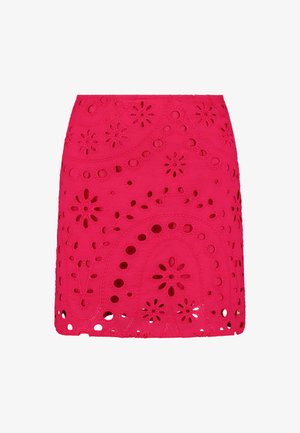 Roosa tikandiga mini seelik, millel on lõigatud lillemustrid, laineline alläär ja detailne tikand kogu materjali ulatuses.