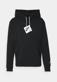 Felpa con cappuccio nera in cotone, dotata di tasca frontale, cordini bianchi e etichetta con il logo Jumpman sul petto.