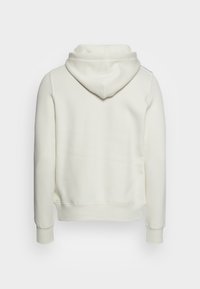 Felpa con cappuccio in bianco sporco, caratterizzata da una texture morbida, una vestibilità rilassata e polsini a coste. Design semplice senza loghi o motivi visibili.