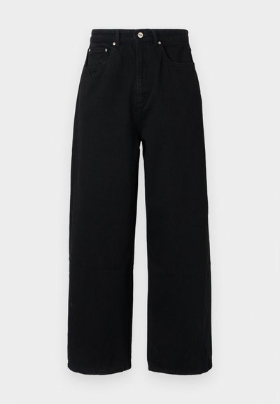 Μαύρο παντελόνι με φαρδιά γραμμή από βαμβάκι, διαθέτοντας ψηλή μέση, μπροστινές τσέπες, κουμπί σε ασημί απόχρωση και καθαρή τελείωση.