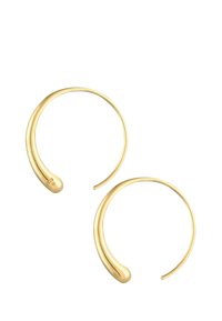 Orecchini a cerchio in tono dorato con un design liscio e curvo e una punta affusolata. Metallo leggero, stile minimalista, finitura lucida.