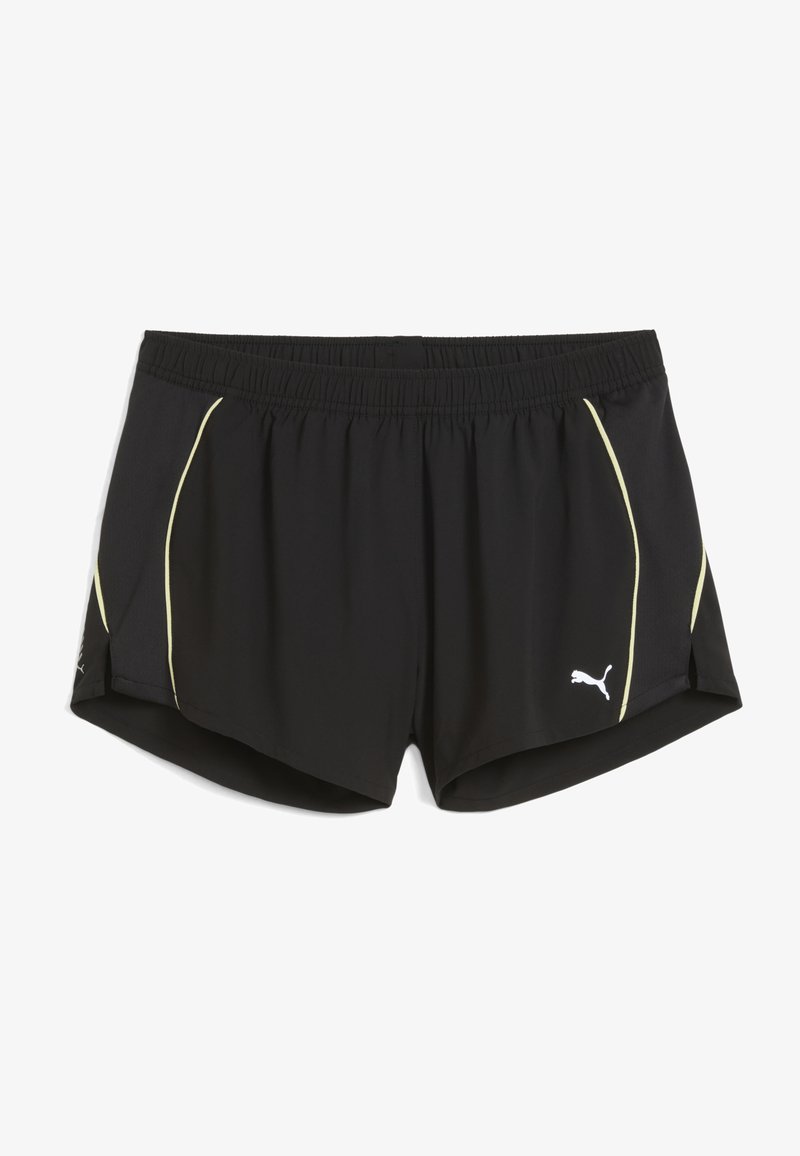 Shorts de sport noirs en matériau léger, avec des accents jaunes sur les côtés et une taille élastique. Logo positionné en bas à gauche.