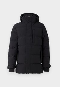 Chaqueta acolchada negra con cuello alto, cierre de cremallera, bolsillo frontal y puños elásticos. Textura suave con secciones acolchadas en todo su diseño.
