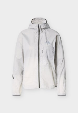 Hellgraue Kapuzenjacke mit durchgehendem Reißverschluss vorne, Reißverschlusstasche auf der Brust, elastischen Bündchen und dezentem Logo auf der linken Brustseite.