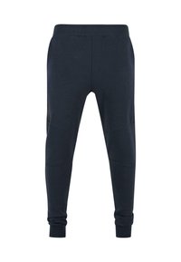Námornícke joggery s priliehajúcim strihom, vyrobené z mäkkej tkaniny. Obsahujú rebrované manžety a bočné vložky pre ďalšie detaily a textúru.