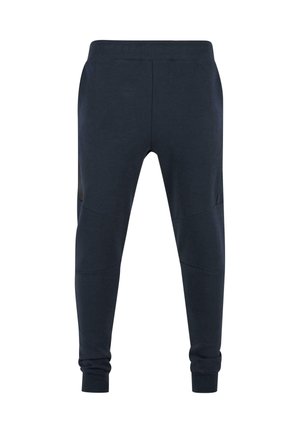 Joggers della marina con un design aderente, realizzati in tessuto morbido. Presentano polsini a costine e pannelli laterali inserti per un ulteriore dettaglio e texture.