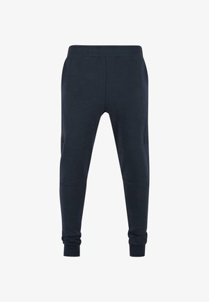 Marine joggers met een aansluitend ontwerp, gemaakt van zachte stof. Bevat ribgebreide manchetten en zij-inzetstukken voor extra detail en textuur.