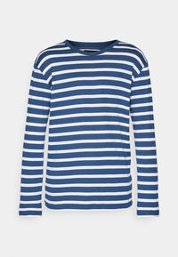 Gestreiftes langärmliges Shirt in Marineblau und Weiß mit Rundhalsausschnitt und weichem Stoff. Gerader Saum und lockere Passform.