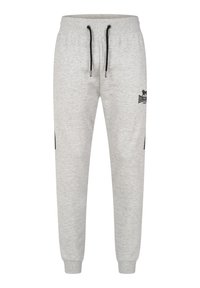 Svijetlosive sweatpants napravljene od mekog materijala, s elastičnim pojasom i crnim šnajdericama, bočnim džepovima i logotipom na butini.