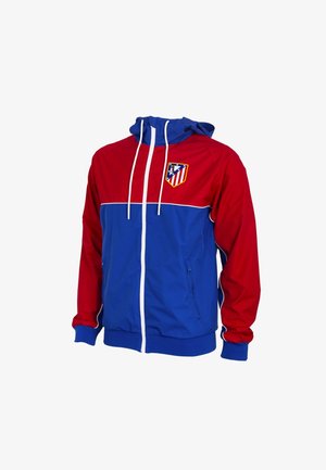 Rode en blauwe capuchontrui met ritssluiting, witte trekkoorden en het Atlético Madrid-logo op de borst, voorzien van ritssluiting aan de zijzakken en een capuchon.