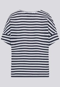 Striped short-sleeve top featuring navy and white horizontal stripes, a loose fit, and a round neckline with a textured knit fabric.