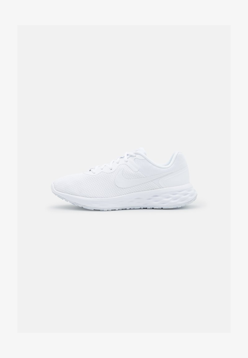 White athletic shoes with a mesh upper, rounded toe, padded collar, and cushioned sole. Features subtle Nike logo on the side.