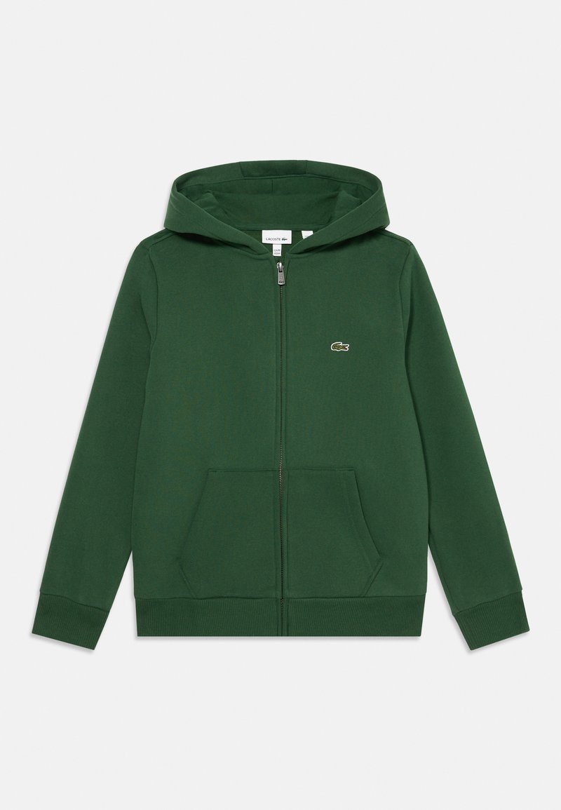 Zelena zip dukserica od mekanog materijala, s prednjim kenguruvim džepom, rebrastim manžetama i malim logom na gornjem lijevom dijelu.