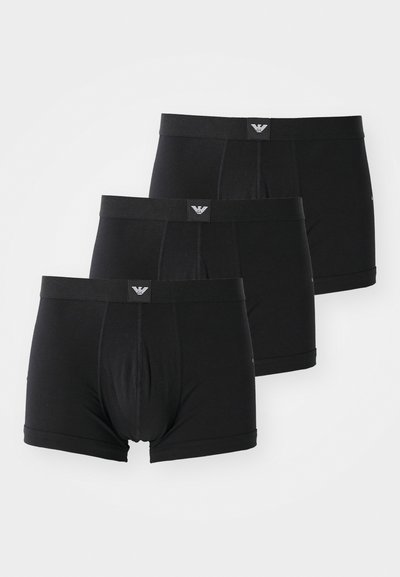 Black boxer briefs in a set of three, featuring a soft elastic waistband with a logo tag, and a streamlined design for comfort.