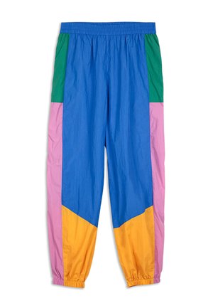 Windbreaker pants featuring a blue main fabric with green, pink, and yellow color blocks. Elastic waistband and tapered cuffs.