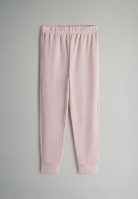 Svetloružové teplákové nohavice s elastickým pásom, zúženými nohavicami a rebrovanými manžetami. Hladká textura bez vzorov alebo ďalších detailov.