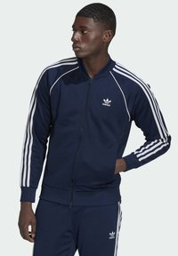 adidas Originals Športna jopa s kapuco na zadrgo - blue