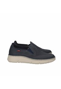 Scarpe slip-on blu scuro in pelle liscia con pannelli elastici ai lati e suola in gomma beige texturizzata, caratterizzate da un dettagli di cucitura a contrasto.