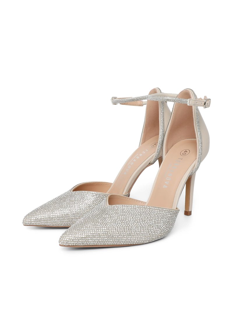 Scarpe col tacco da donna con cinturino posteriore | Acquisti Online su