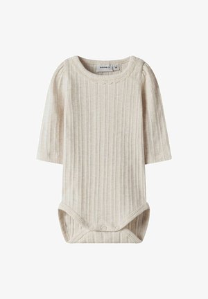 Body bébé crème à manches longues en tissu côtelé avec fermetures à pression au bas et fine bordure en dentelle autour de l'encolure.