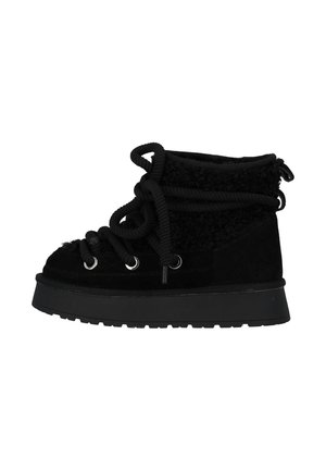 Black ankle boots with a textured fabric upper and suede accents. Features thick black laces, metal eyelets, and a flat rubber sole.