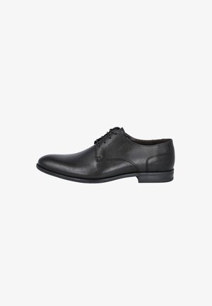 Zapato de vestir para hombre de cuero negro con cordones, punta redondeada y tacón bajo, mostrado de perfil sobre un fondo blanco.