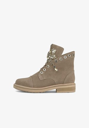 Tan suede ankle boots with a decorative beaded design on the front, metal eyelets, and a wooden sole. Round toe and low heel.