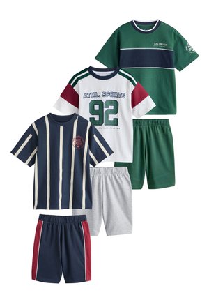 Child wearing a navy blue t-shirt with white vertical stripes and red text reading "COOL VIBES CLUB ATHL. SPORTS" and city names around it.