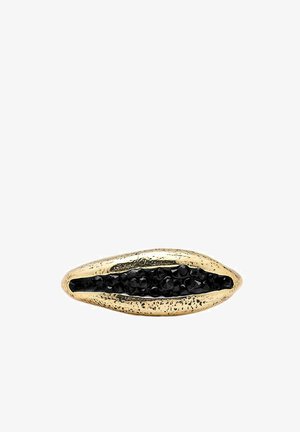 Gold ring shaped like a shell, featuring a textured finish and a central lining of black stones. Smooth edges with an elongated design.