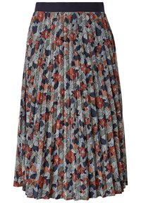 Jupe plissée avec une taille de couleur bleu marine foncé. Dotée d'un motif floral en rouge, orange, vert et bleu sur un fond texturé clair.