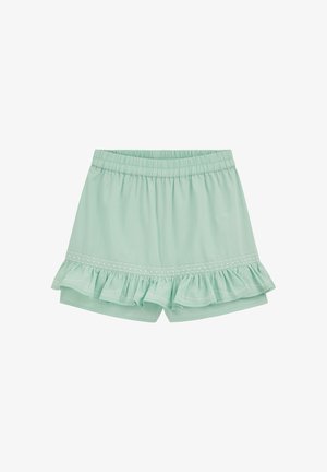 Fustă cu talie elastică de culoare verde deschis, cu tiv cu volan și detalii cusute subtile deasupra volanului.