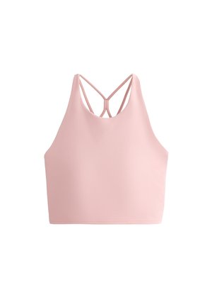 Vaaleanpunainen urheiluliivit, jossa on korkea kaula-aukko ja ristikkäinen selkädesign. Valmistettu sileästä, joustavasta kankaasta saumattomalla viimeistelyllä.