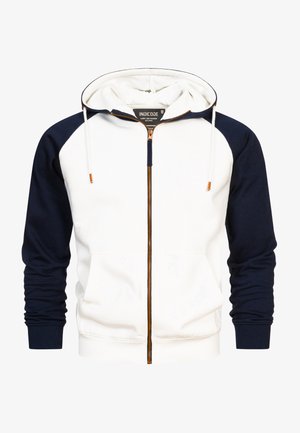White and navy zip-up hoodie with raglan sleeves, featuring a kangaroo pocket, drawstring hood, and copper-colored zipper accents.