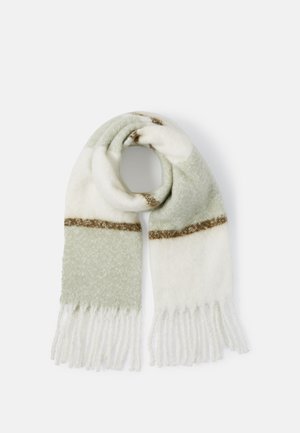 Ullblandede skjerf i lysegrønn og hvit med et brunt stripemønster. Har en myk tekstur og frynser i endene for ekstra detalj.