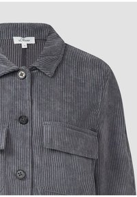 Gray corduroy jacket featuring vertical ribbing, a collared neckline, two chest pockets, and button closures.