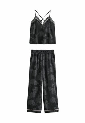 Black floral-patterned sleep set with a sleeveless top featuring lace trim and crisscross straps, paired with relaxed-fit, elastic waistband pants.
