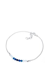 Silberne Kettenarmband mit einem Farbverlauf aus blauen und klaren facettierten Kristallen, ausgestattet mit einem Karabinerverschluss und verstellbarer Länge.