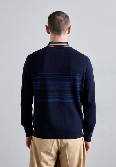 Navy sweater with a striped collar and horizontal lines in varying shades of blue across the back. Slim fit, knitted fabric, long sleeves.