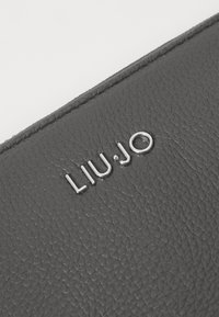 LIU JO ZIP AROUND - Portafoglio - rosso pompeiano