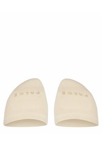 Chaussette invisibles beige avec une texture côtelée, un bout arrondi et un motif logo discret près du bord supérieur. Conçue pour une visibilité minimale.