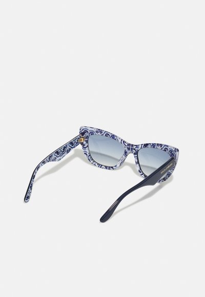Cat-eye sunglasses with a blue and white patterned frame. Gray gradient lenses, gold accent on the hinge, and solid black temples.