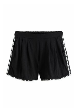 Black casual shorts with elastic waistband and white zigzag trim along sides and hem, made of soft fabric.
