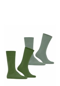 Zwei Paar Socken in unterschiedlichen Grüntönen: ein dunkelgrünens Set und ein hellgrünens Set, dargestellt vor einem weißen Hintergrund.