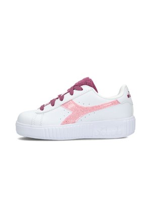 White sneaker with pink accents and a suede-like logo. Features round laces, a textured rubber sole, and a padded tongue.