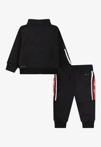 Nike Sportswear CLUB PROPUS UNISEX SET - Pantaloni de trening - black